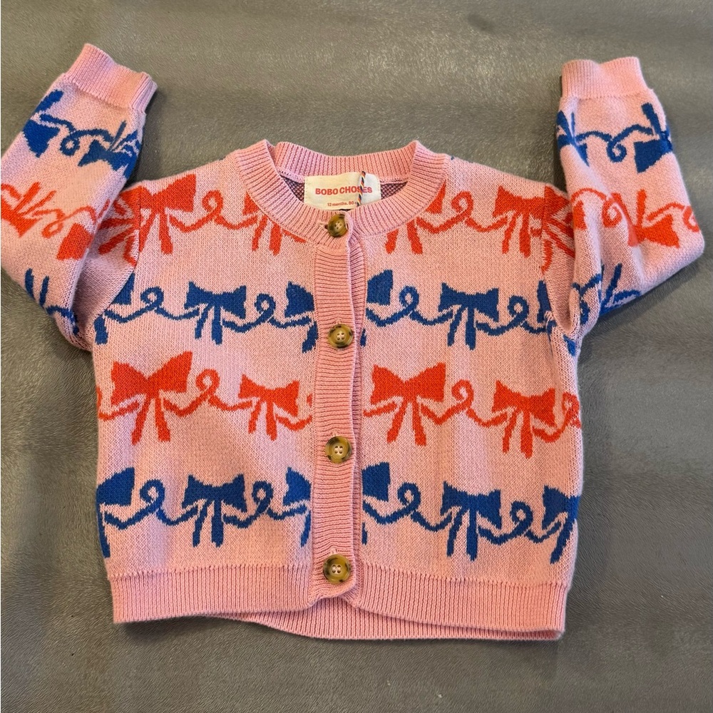 Bobo Choses Pink Knit Cardigan with Red & Blue Bow Pattern. Size 12 months